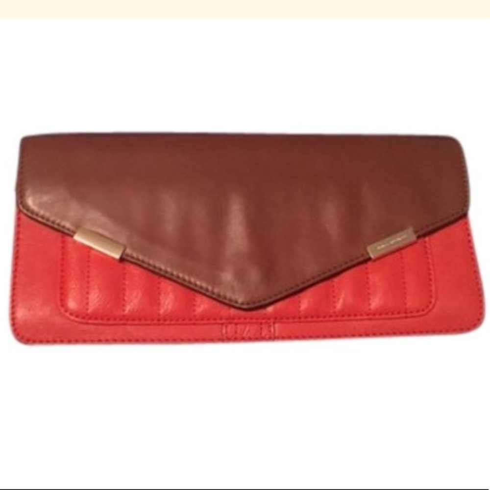 Rebecca Minkoff leather clutch in orange and brown